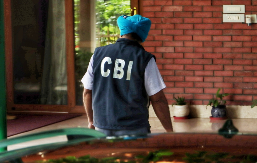 A Central Bureau of Investigation (CBI) official during a raid at the residence of Delhi Deputy Chief Minister Manish Sisodia in connection with Delhi Excise Policy case