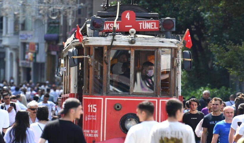 People walk on a street in Istanbul, Turkey