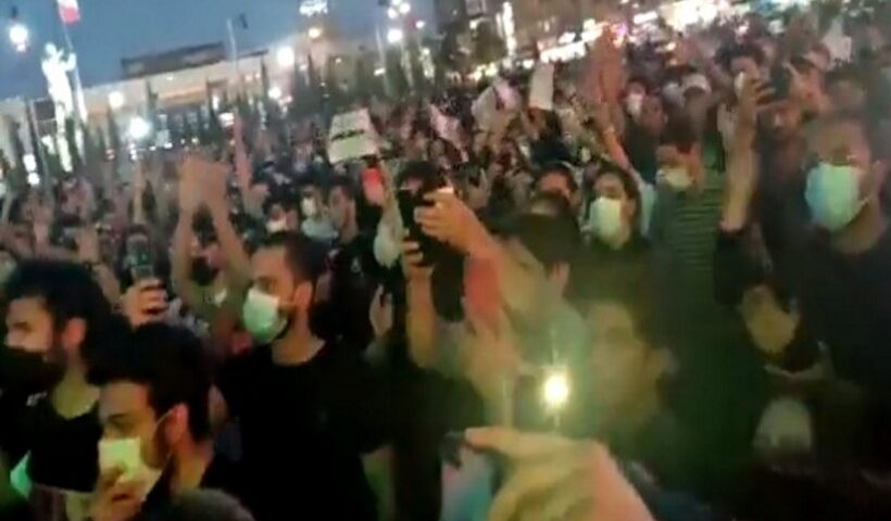 Women burn headscarves as anti-hijab protests continue