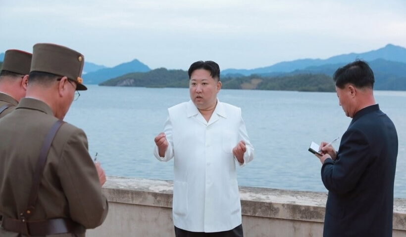 Seoul :This photo, provided by the Korean Central News Agency on Oct. 10, 2022, shows North Korean leader Kim Jong-un talking to military officials during his inspection of major drills.