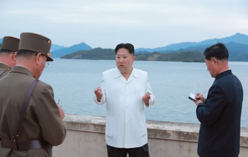 Seoul :This photo, provided by the Korean Central News Agency on Oct. 10, 2022, shows North Korean leader Kim Jong-un talking to military officials during his inspection of major drills.