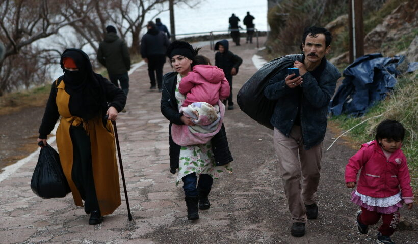 MYTILENE (GREECE), March 1, 2020 (Xinhua) -- Refugees from Afghanistan arrive at Skala Sikaminias, on the island of Lesvos, Greece,