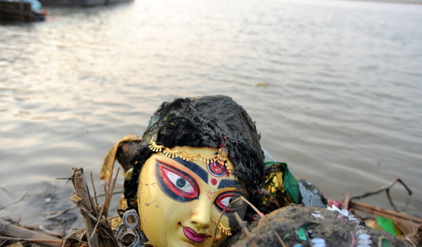 Kolkata: An idol of Goddess Durga being immersed in the Ganga river,
