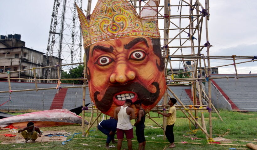 Artists working on the effigy of Ravana ahead of the Dussehra festival in Guwahati