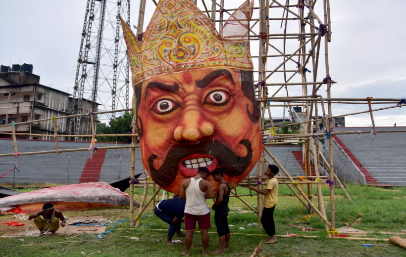 Artists working on the effigy of Ravana ahead of the Dussehra festival in Guwahati