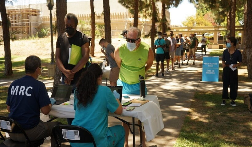 People wait to be vaccinated at a monkeypox vaccination site in Los Angeles, California, the United States
