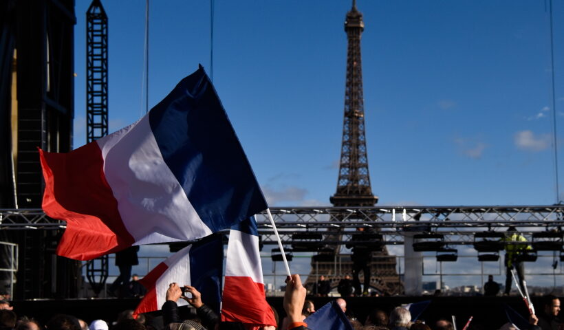 PARIS, March 6, 2017 (Xinhua) -- Flags are seen during a campaign rally of presidential candidate Francois Fillon at the Trocadero square in Paris, France,