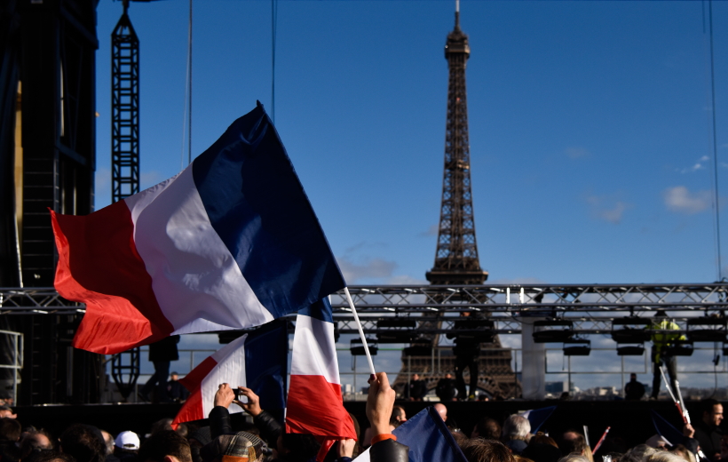 PARIS, March 6, 2017 (Xinhua) -- Flags are seen during a campaign rally of presidential candidate Francois Fillon at the Trocadero square in Paris, France,
