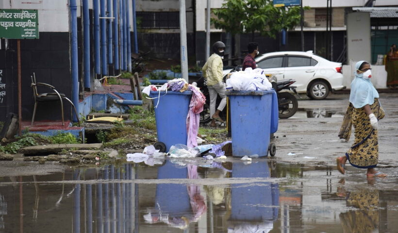Patna: Garbage brimming out of the dustbins placed outside the Nalanda Medical College and Hospital in Patna,