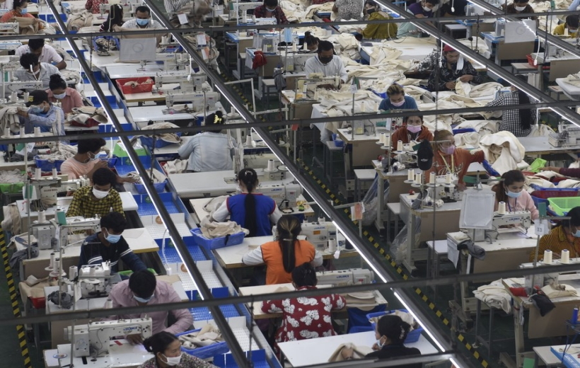 Garment workers make clothes at a factory in Phnom Penh, Cambodia.