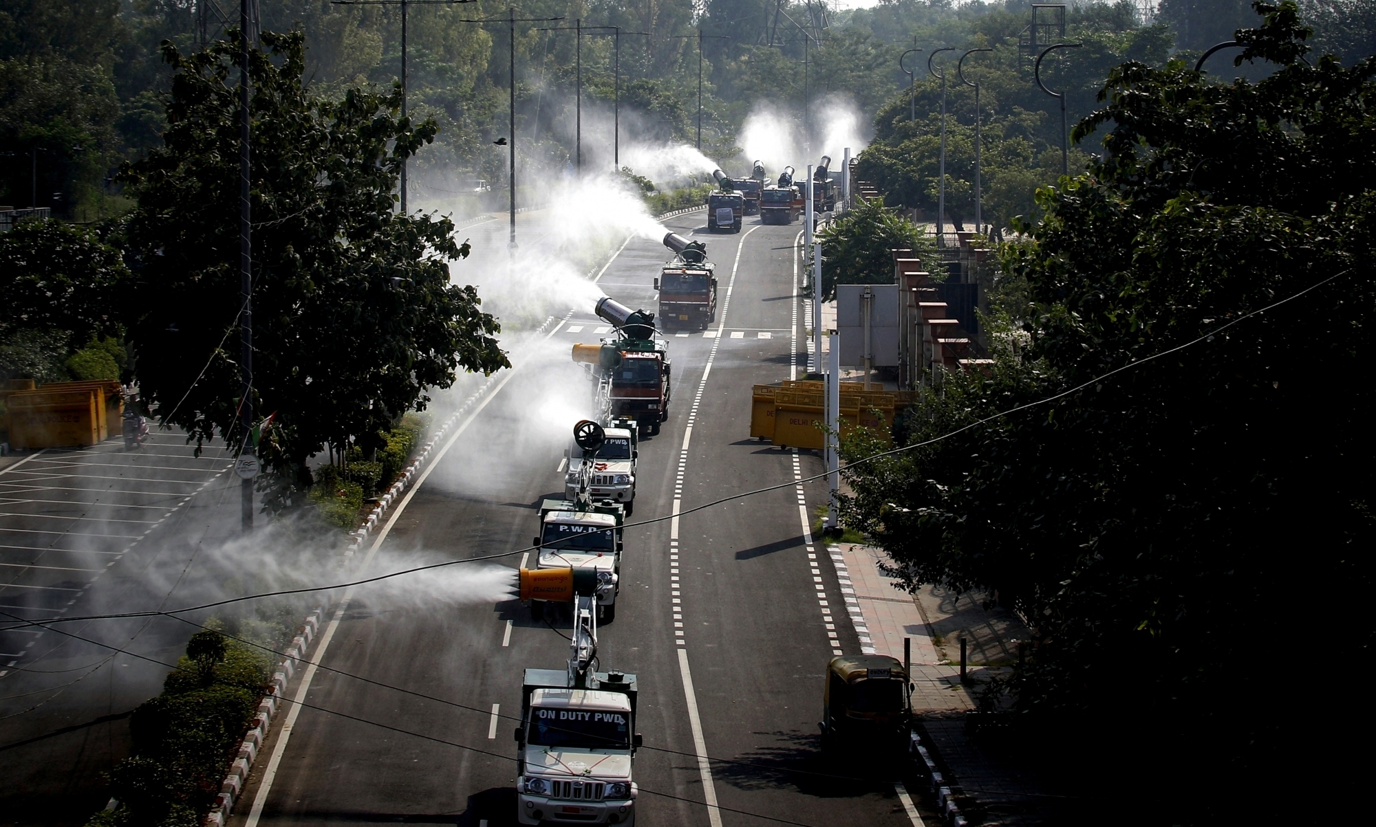 Mobile Anti-Smog Guns vehicles sprinkle water