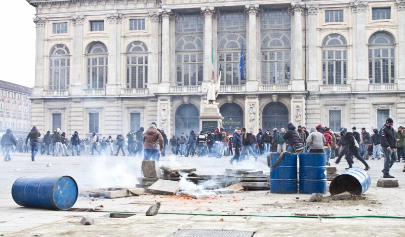 Protestors clash with policemen during the demonstration in Torin, Italy on Dec. 9, 2013. Striking workers and truckers c