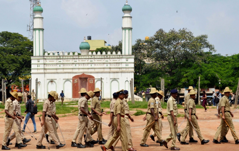 Bengaluru: Police personnel deployed at the disputed Idgah Maidan after Karnataka