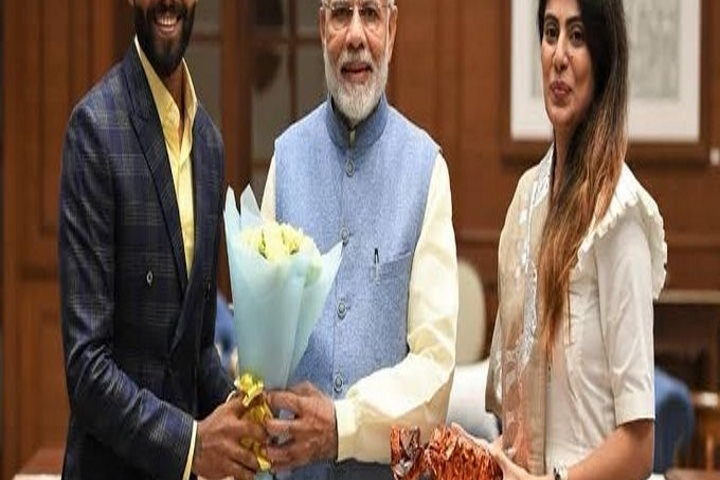 रवींद्र जडेजा,रिवाबा जडेजा और पीएम मोदी