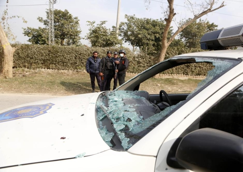 A police car is damaged in a suicide attack in Pakistan's capital Islamaba