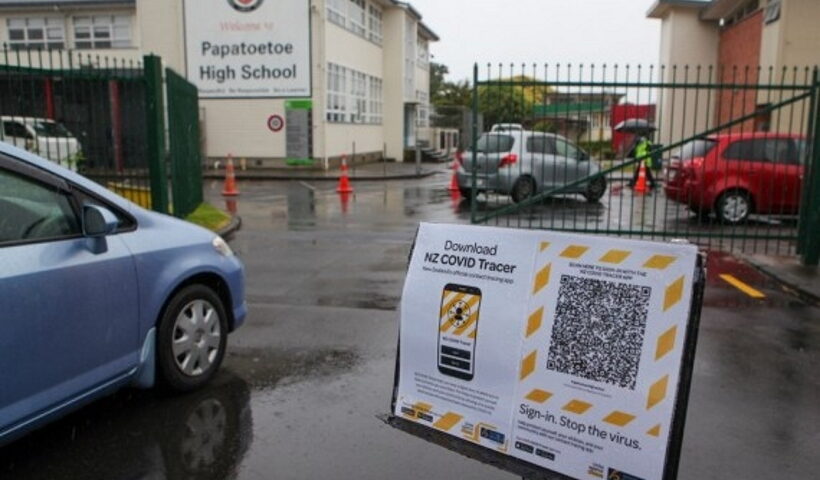 People drive to a temporary COVID-19 testing site in Auckland, New Zealand