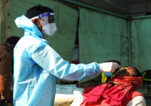New Delhi: A healthcare worker collects swab samples for the COVID-19 test in view of rising Omicron cases at Anand Vihar in New Delhi