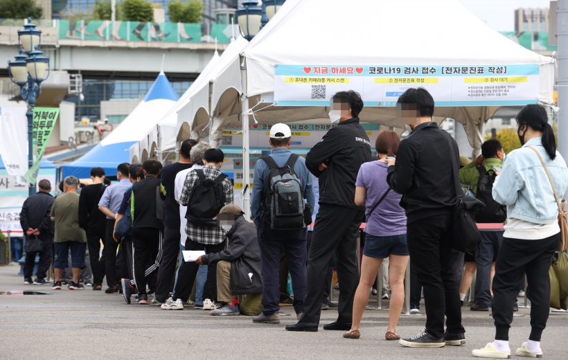 Daily virus cases in Seoul exceed 1