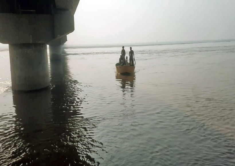 Meerut: Local people during rescue operation after a boat