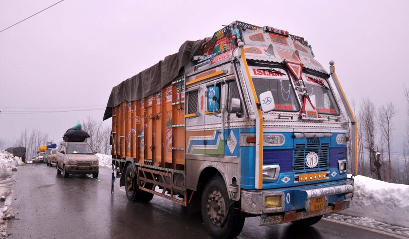 883740 Caption: Qazigund: Vehicles ply on Jammu-Srinagar highway that was restored for one-way traffic after seven days following avalanches and landslides, in Qazigund