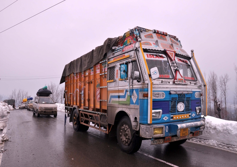 883740 Caption: Qazigund: Vehicles ply on Jammu-Srinagar highway that was restored for one-way traffic after seven days following avalanches and landslides, in Qazigund