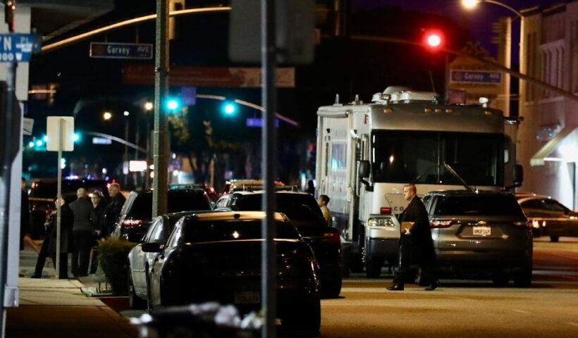 Police officers stand guard on the scene of a mass shooting in Monterey Park, California, the United States