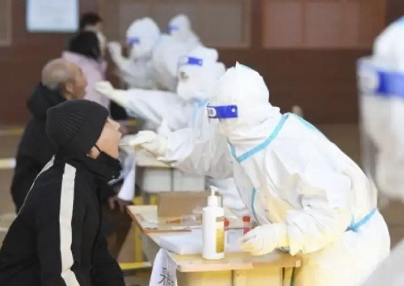 China's growth projections sink further amid Covid surge