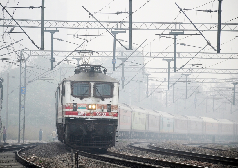 New Delhi: A train moves slowly on track amid dense fog during a cold morning, in New Delhi