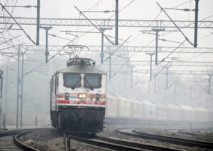 New Delhi: A train moves slowly on track amid dense fog during a cold morning, in New Delhi on Monday