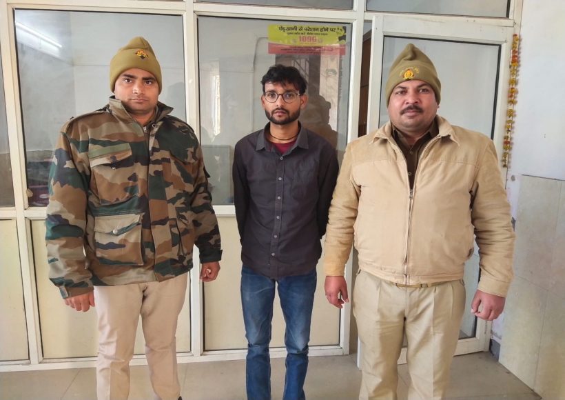 Wanted accused arrested for conducting exam by sitting solver.