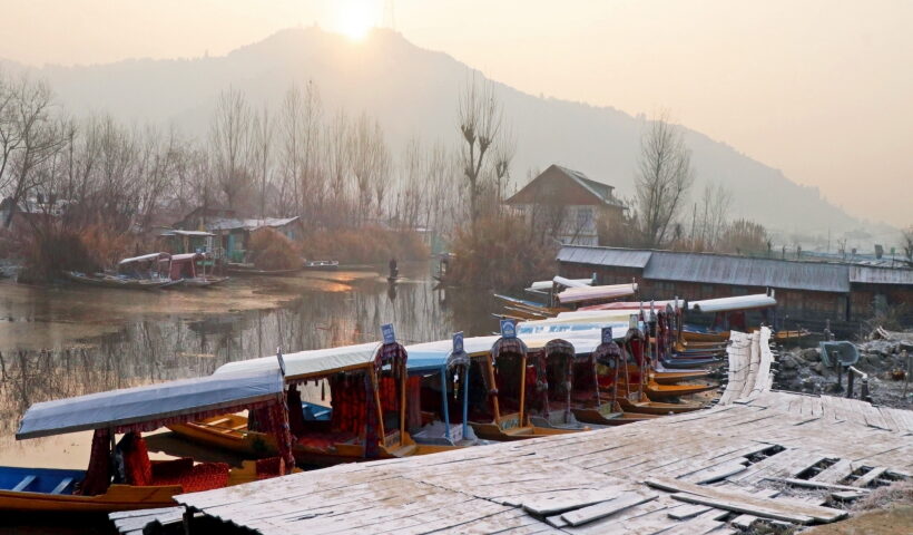 Srinagar: A view of Shikaras seen at the Dal Lake on a cold day, in Srinagar on Wednesday,