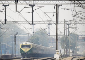 New Delhi: A train moves slowly on track amid dense fog during a cold morning, in New Delhi on Monday