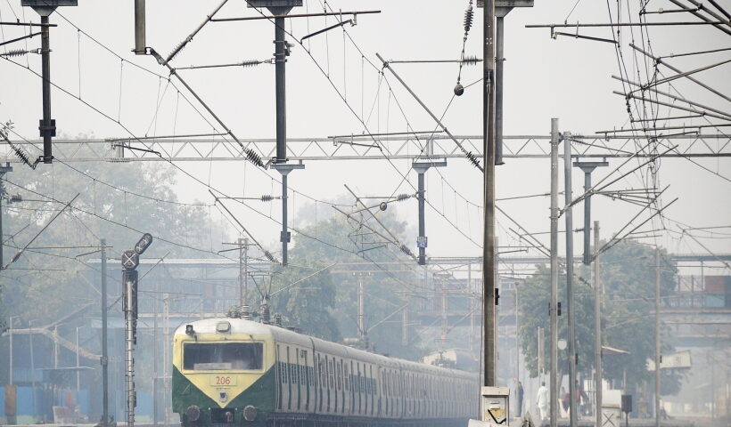 New Delhi: A train moves slowly on track amid dense fog during a cold morning, in New Delhi on Monday