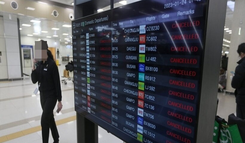 An electronic signboard at Jeju International Airport on the southern Jeju Island shows domestic flights cancelled