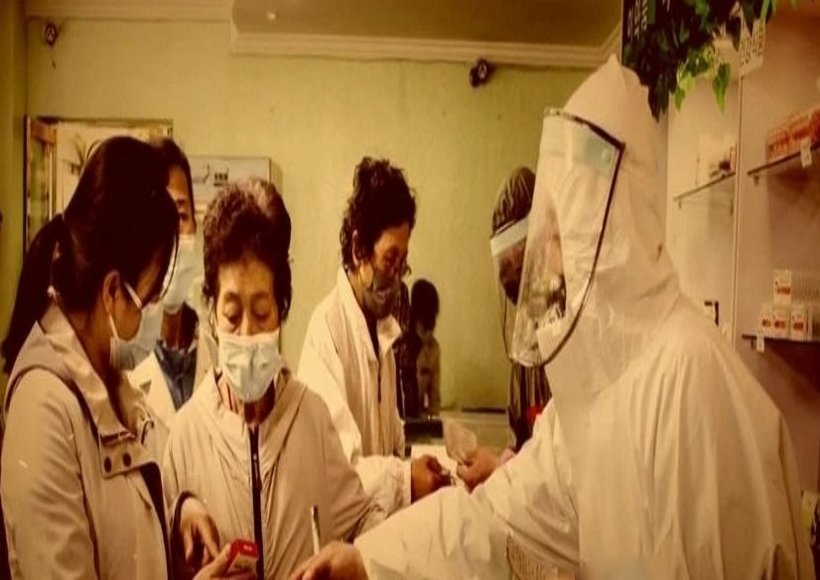 This image, captured from the Korean Central Television on Jan 24, 2023, shows a documentary film aired the previous day touting North Korea's measures against the COVID-19 pandemic.