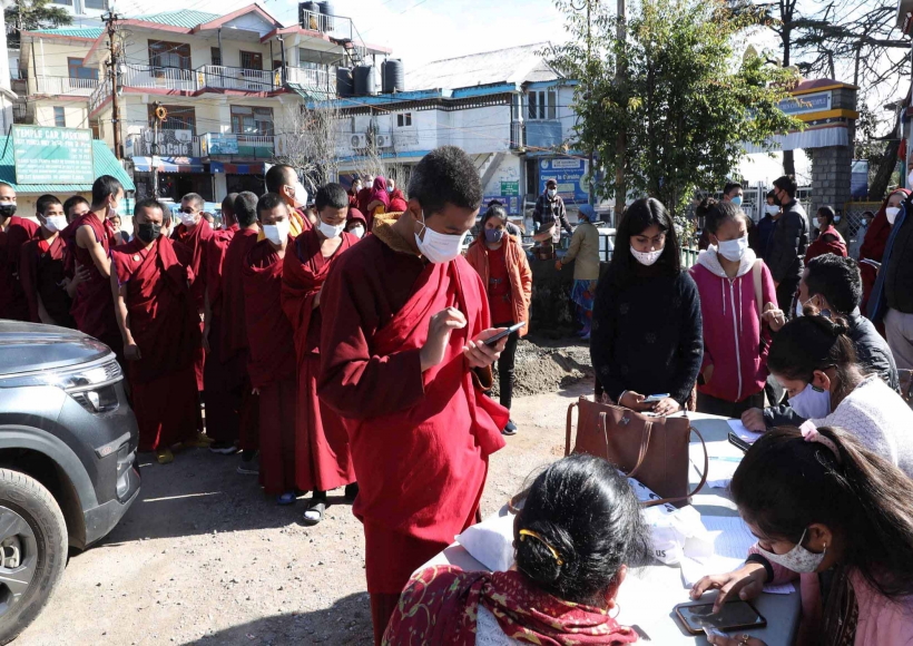 Dharamsala:Young tibetan monks stand in queue to register their name for COVID-19 vaccine outside the main Dalai Lama Temple in Dharamsala