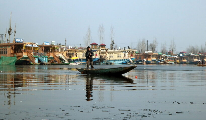 Srinagar: Shikaras seen on frozen Dal Lake as the temperature dips, in Srinagar