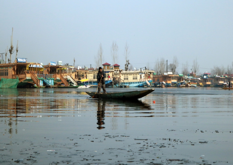 Srinagar: Shikaras seen on frozen Dal Lake as the temperature dips, in Srinagar