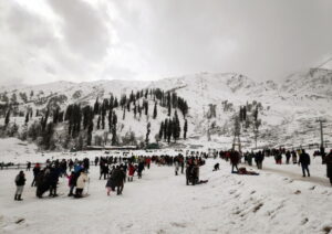 Gulmarg: Tourists enjoy at Gulmarg as the area receives fresh snowfall,