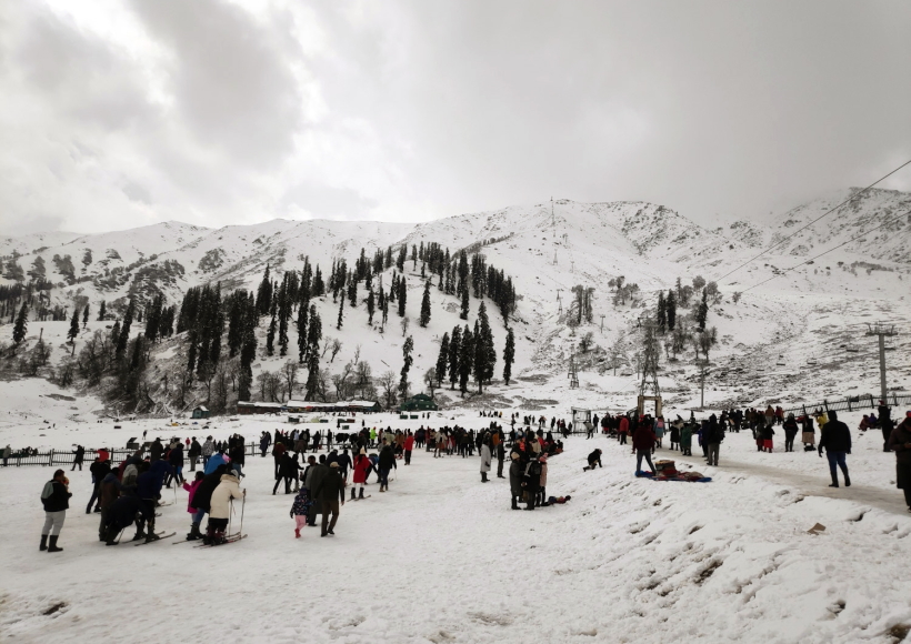 Gulmarg: Tourists enjoy at Gulmarg as the area receives fresh snowfall,
