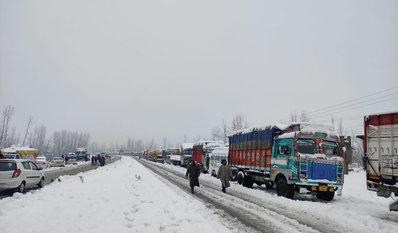 New Delhi: Trucks parked at the side of a road as Jammu-Srinagar National Highway closed due to heavy snowfall in Kashmir on Saturday