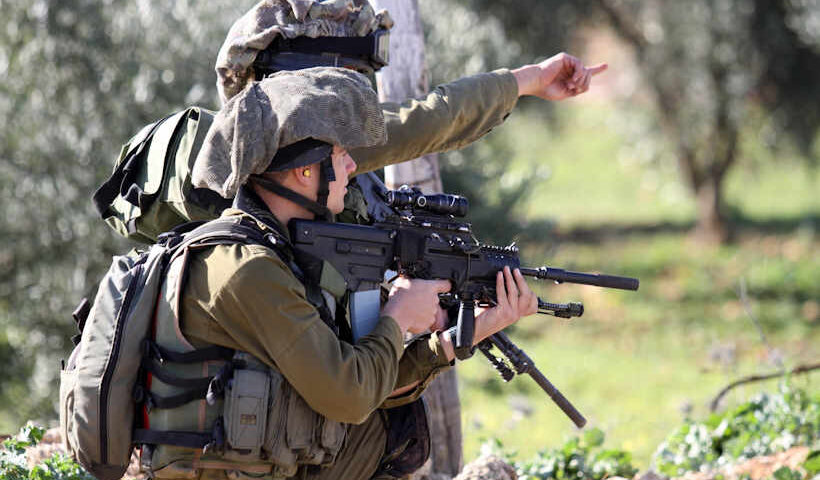 Israeli soldiers take positions