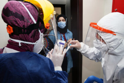 Medical workers conduct COVID-19 antibody test