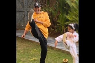 Akshay and daughter Nitara practicing Karate Kicks