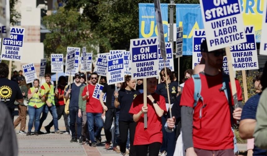 People take part in a protest on campus of the University of California, Los Angeles (UCLA) in Los Angeles