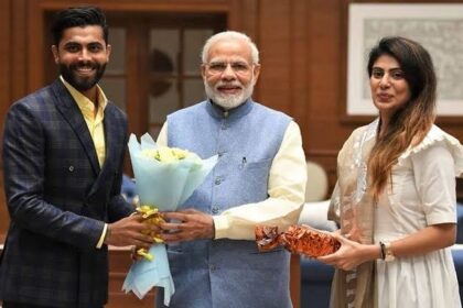 Cricketer Ravindrasinh Jadeja, his wife Rivaba with the Prime Minister Narendra Modi