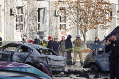 Damaged vehicles are seen after explosions in Kiev