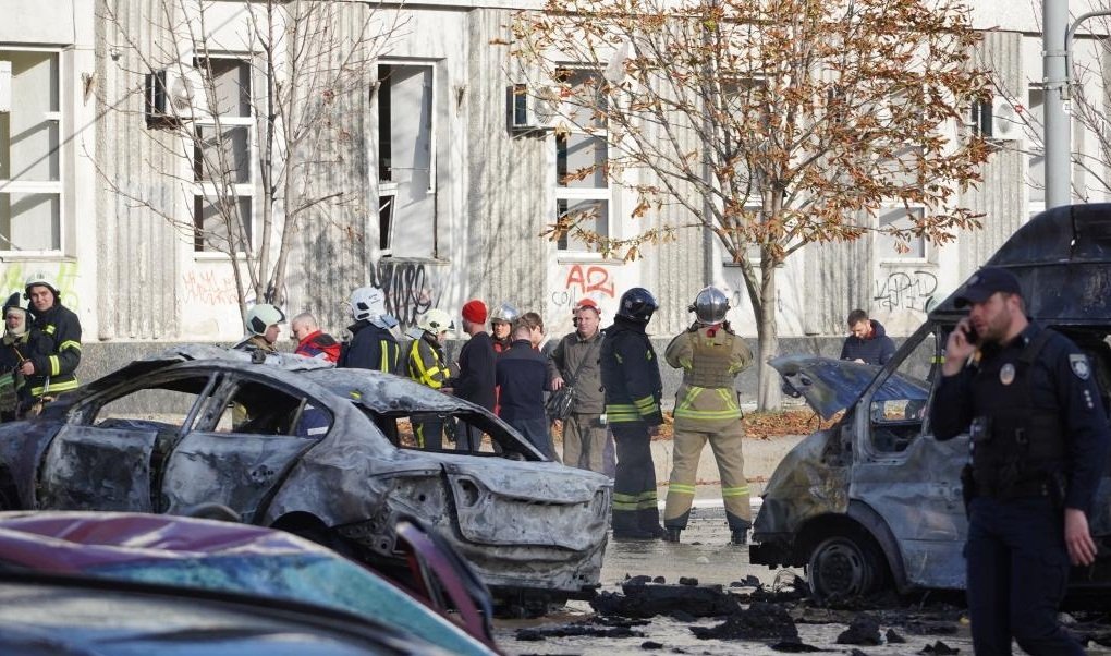 Damaged vehicles are seen after explosions in Kiev