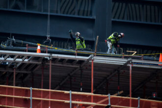 US adds 261,000 jobs in October