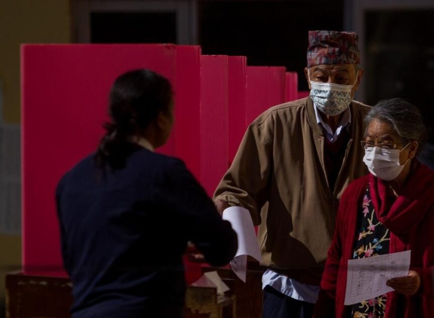 Voters cast ballots during the general elections in Kathmandu